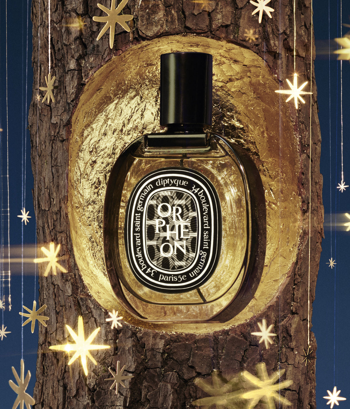 Diptyque Eau de Parfum Orphéon Limited Edition in einer goldenen Baumhöhle