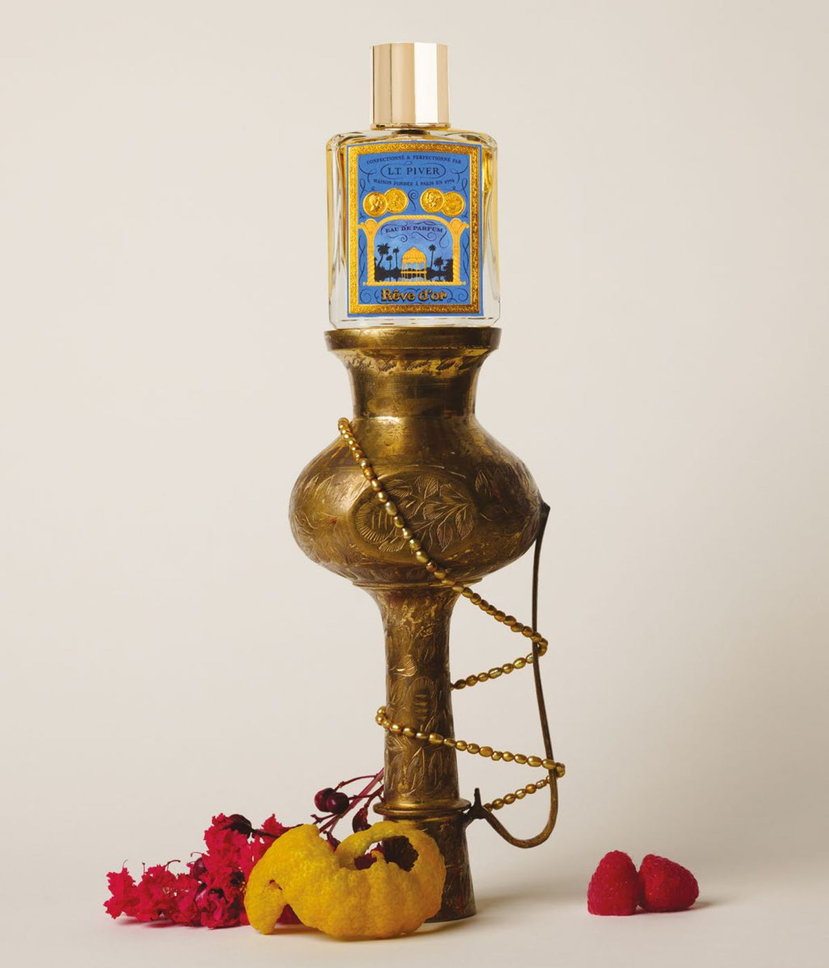 Eau de Parfum Rêve d’Or – L.T. Piver, still life with a brass vase and raspberries
