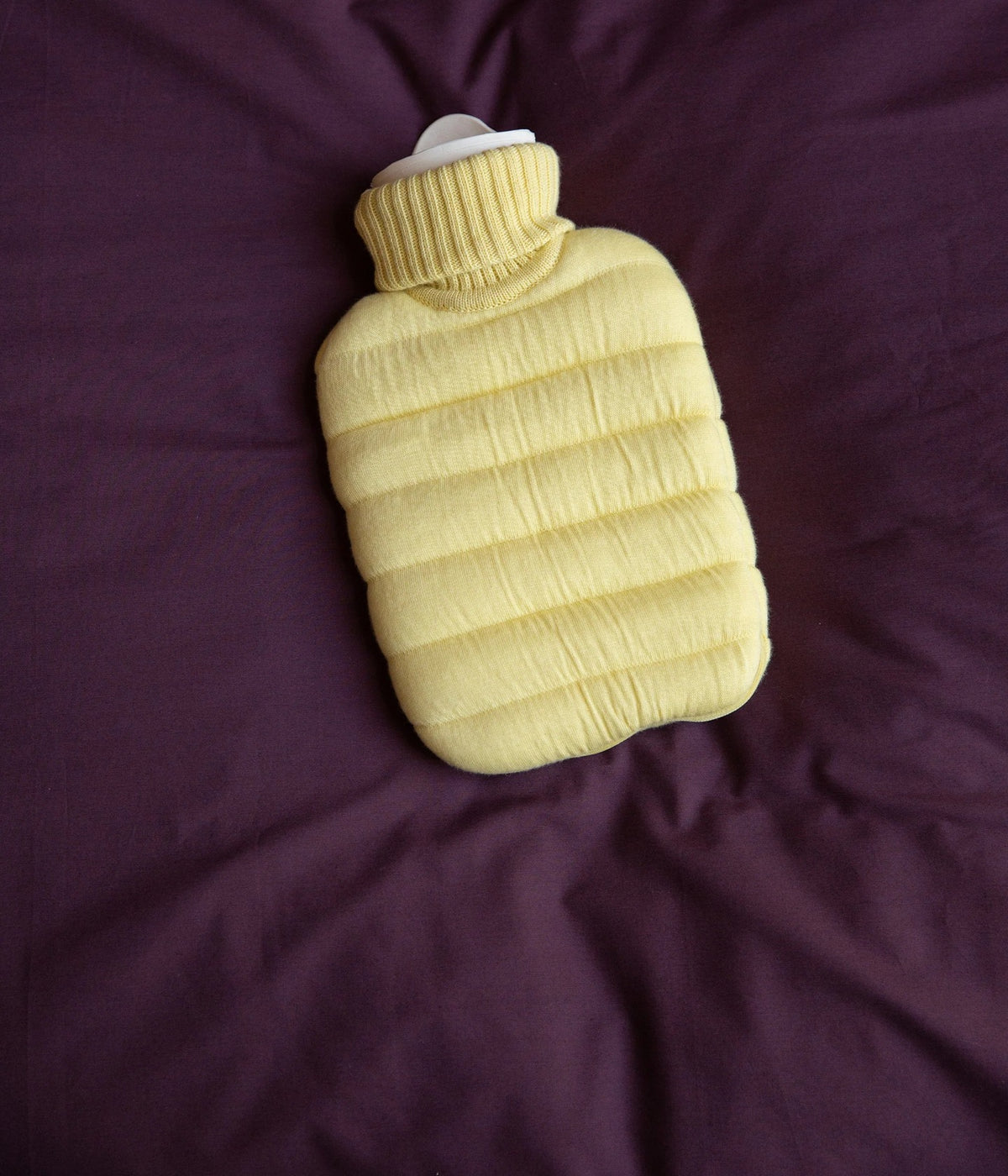 Wärmflasche Mini Puffy Butter Yellow – Suite702, auf Bettwäsche