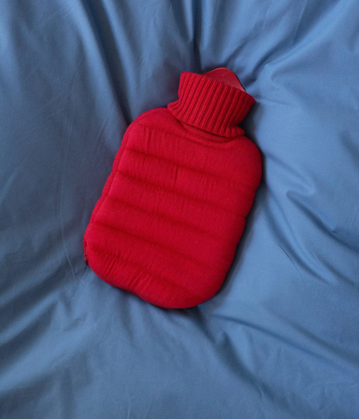 Hot Water Bottle Mini Puffy Cherry Red – Suite702, on bed linen